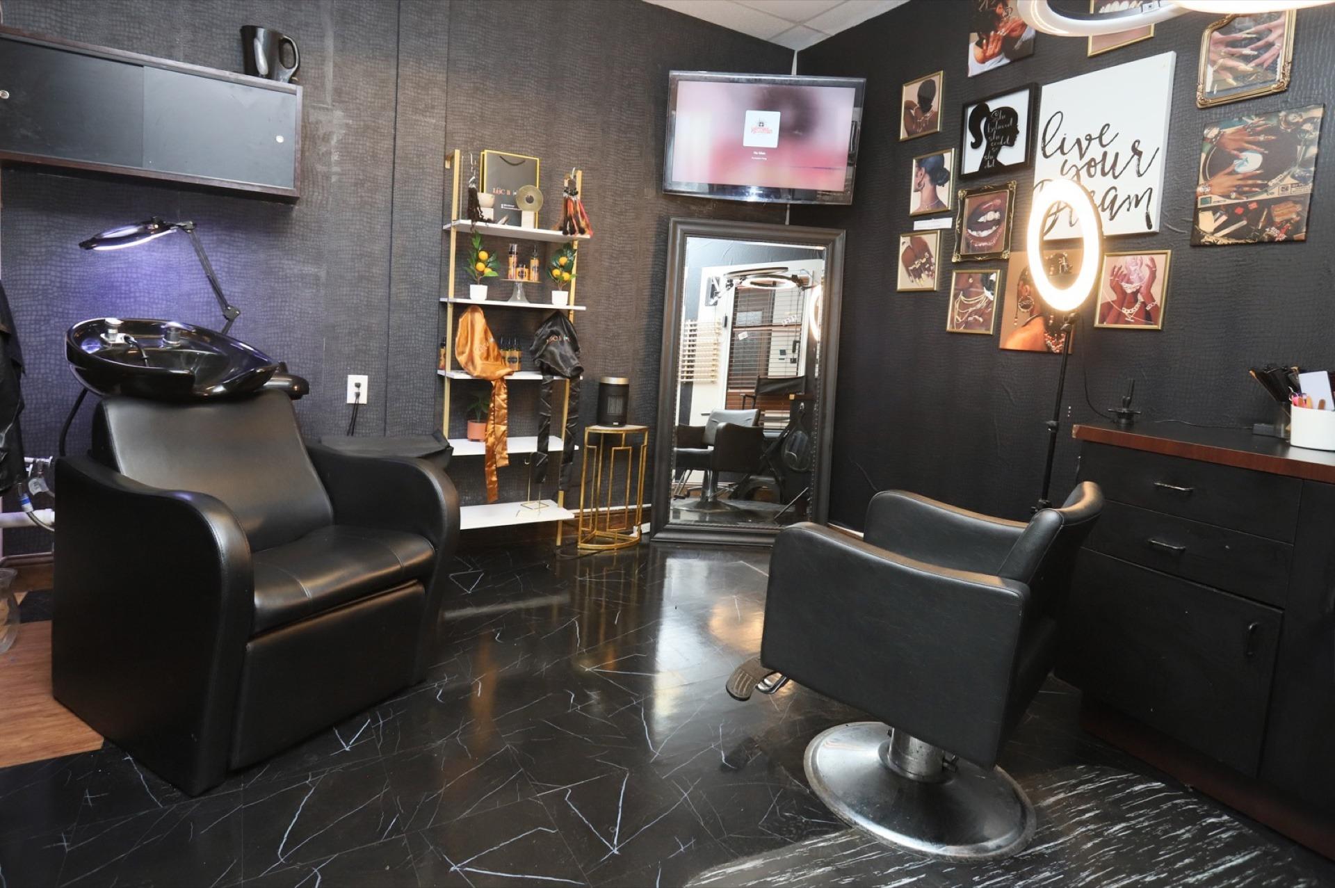 Salon suite with 'Live Your Dream' gallery wall art and shampoo station